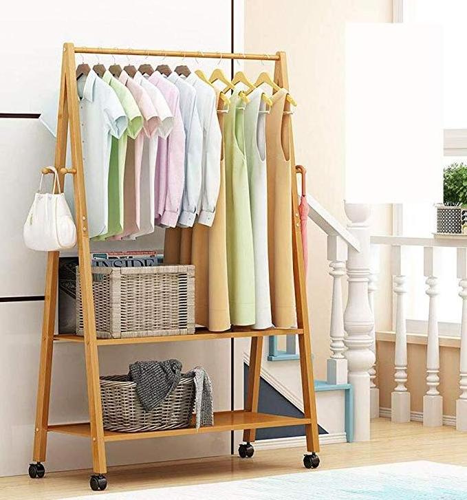 Bamboo Clothes Rack on Wheels Rolling Garment Rack with 2-Tier Storage Shelves and 4 Coat Hooks, for Shoes, Clothing.