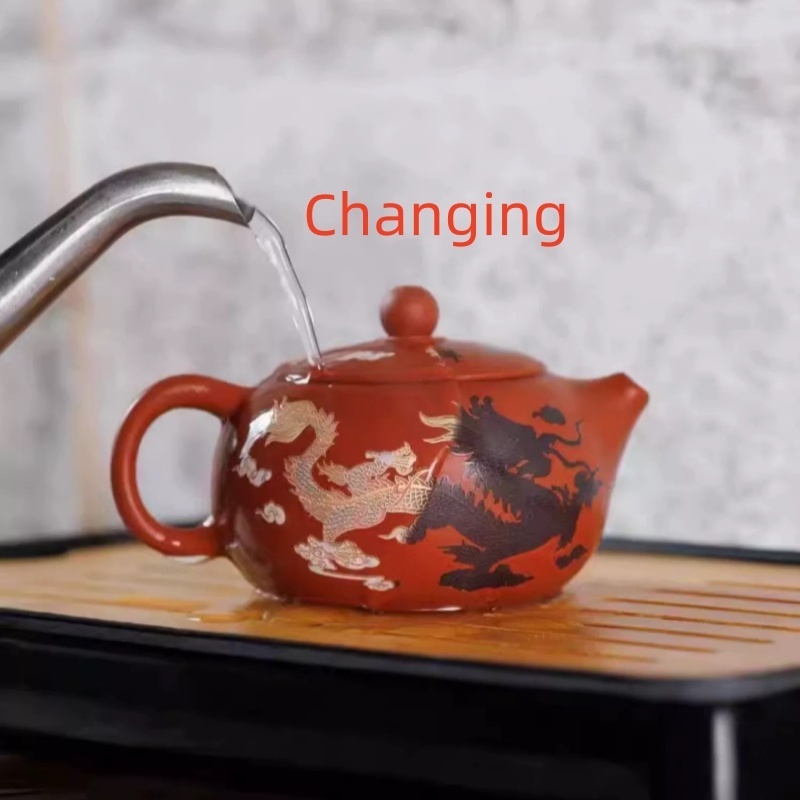 Hot selling Chinese traditional kongfu tea pot ,dragon pattern change color  purple clay tea pot