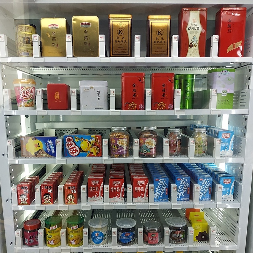 Vending machine with lift system for glass bottle yogurt honey