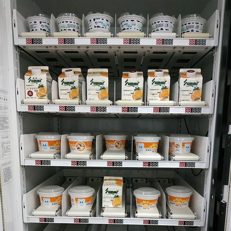 Vending machine with lift system for glass bottle yogurt honey