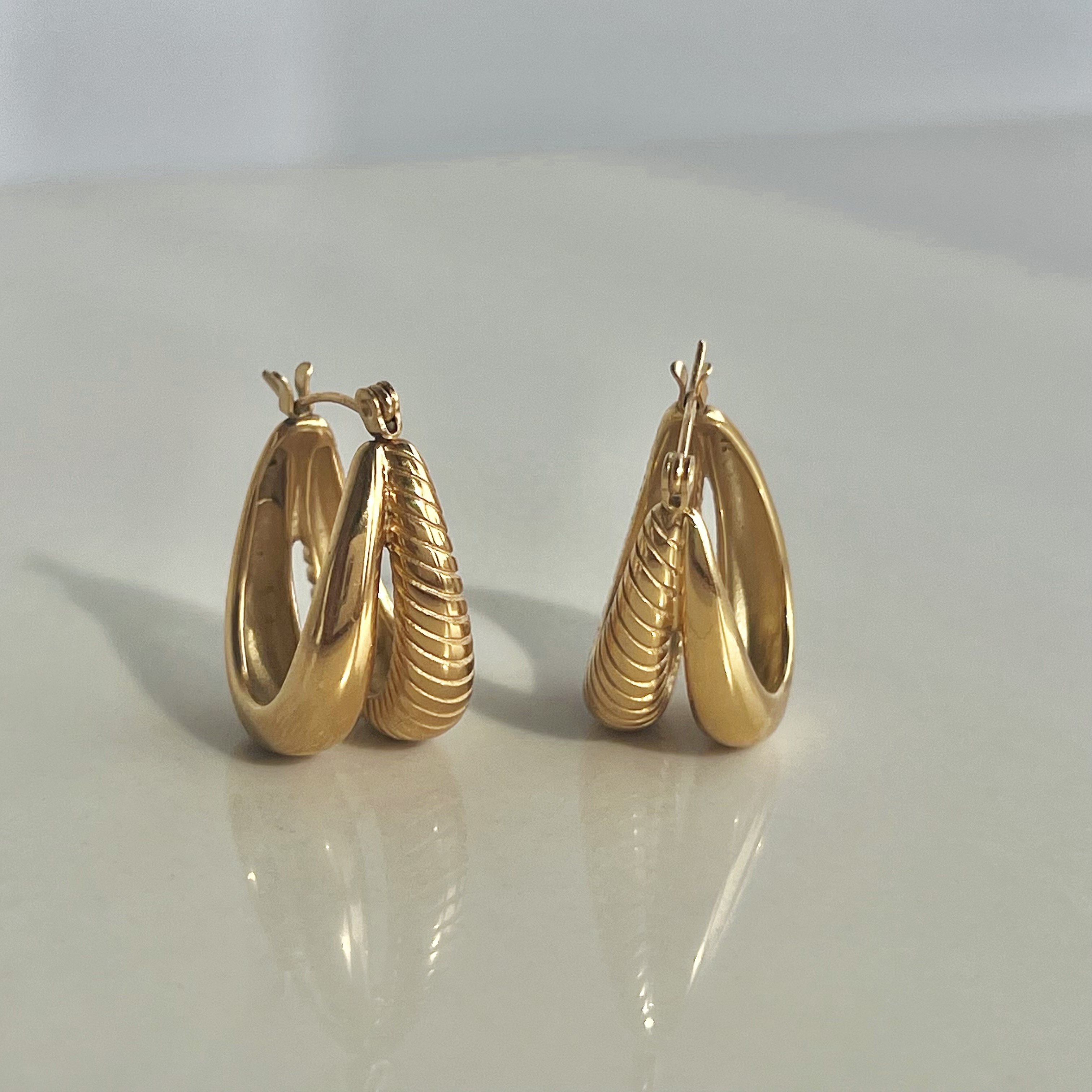 2024 Dazan New Unique Design 18k Gold Plated Hypoallergenic Stainless Steel Tarnish Free Twisted Double Horn Earrings For Women