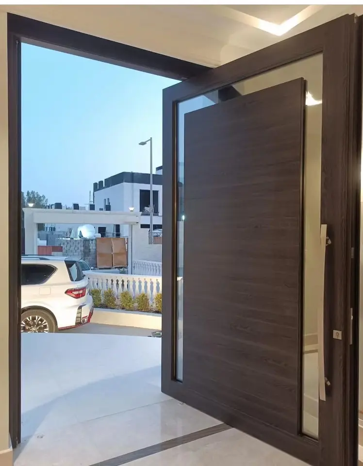 Factory wholesale price modern large smart wooden pivot front door with custom handles