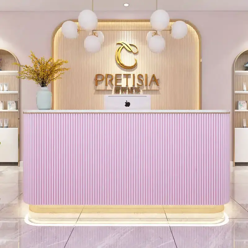 Light Pink  MDF office reception desk modern gold stainless steel bottom with LED light logo can be customized front desk