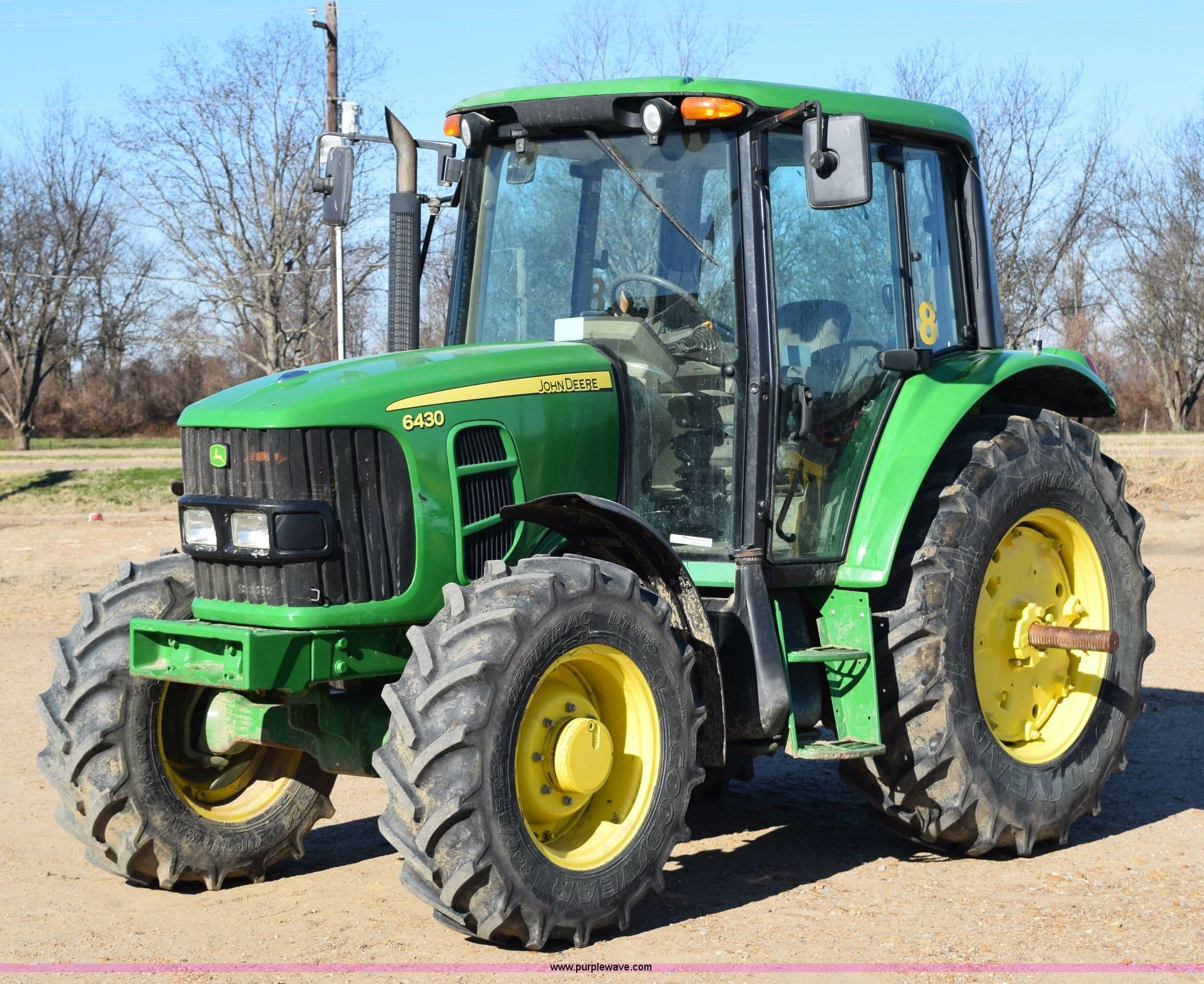 fairly used John and Jeere tractor 110 horse power-4 wheel drive Tractors and get free front loader