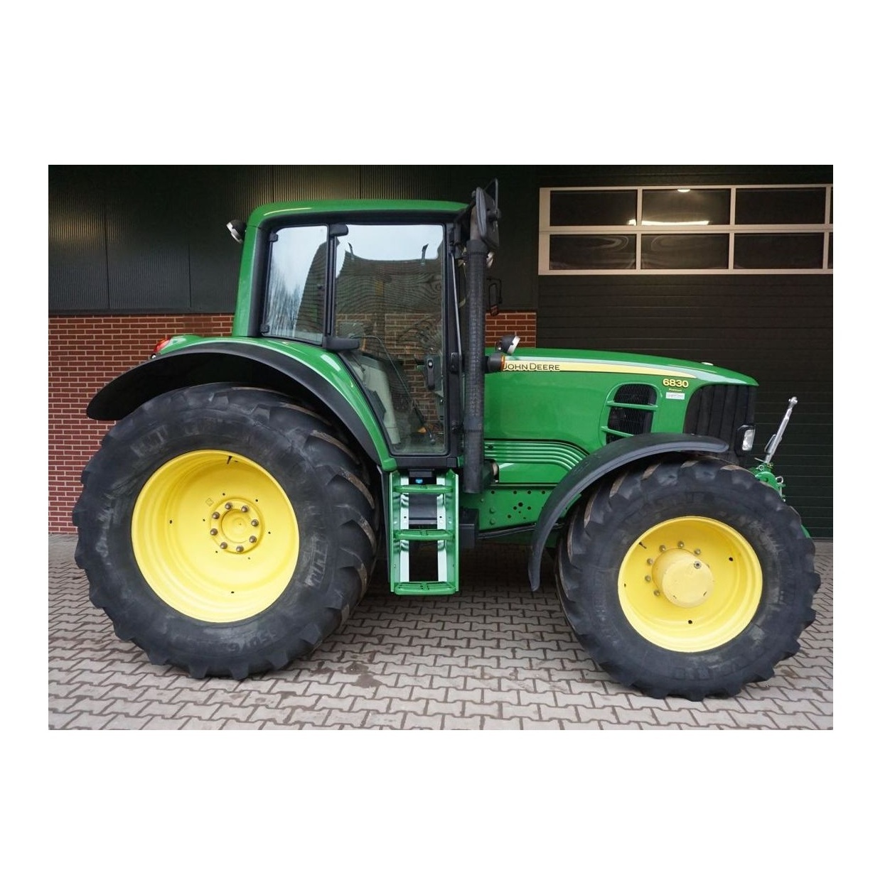 fairly used John and Jeere tractor 110 horse power-4 wheel drive Tractors and get free front loader