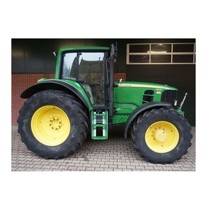 fairly used John and Jeere tractor 110 horse power-4 wheel drive Tractors and get free front loader