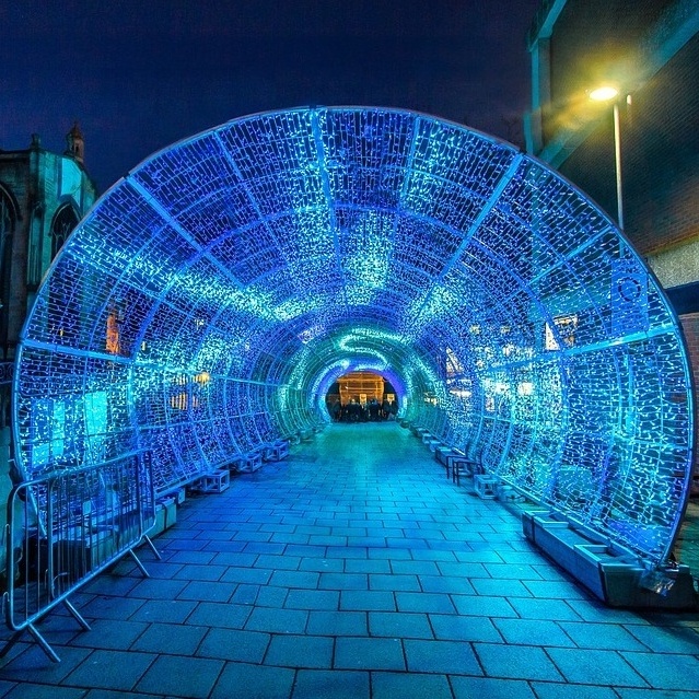 outdoor Christmas Holiday Illuminated Tunnel Lights Geometric Metal Arch Door Tunnel background road guide for event