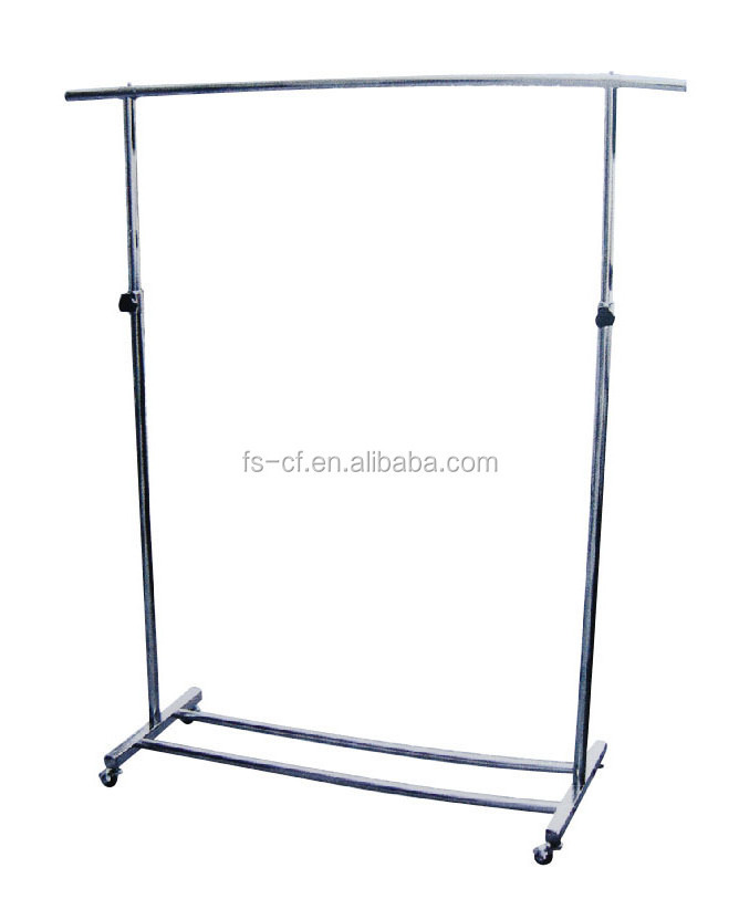 Dress shop's chrome metal free standing hanging clothes display rack with wheels