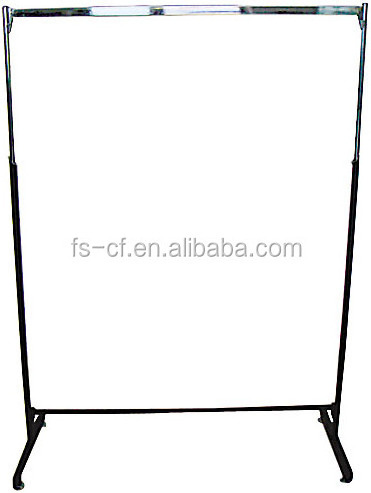 Dress shop's chrome metal free standing hanging clothes display rack with wheels