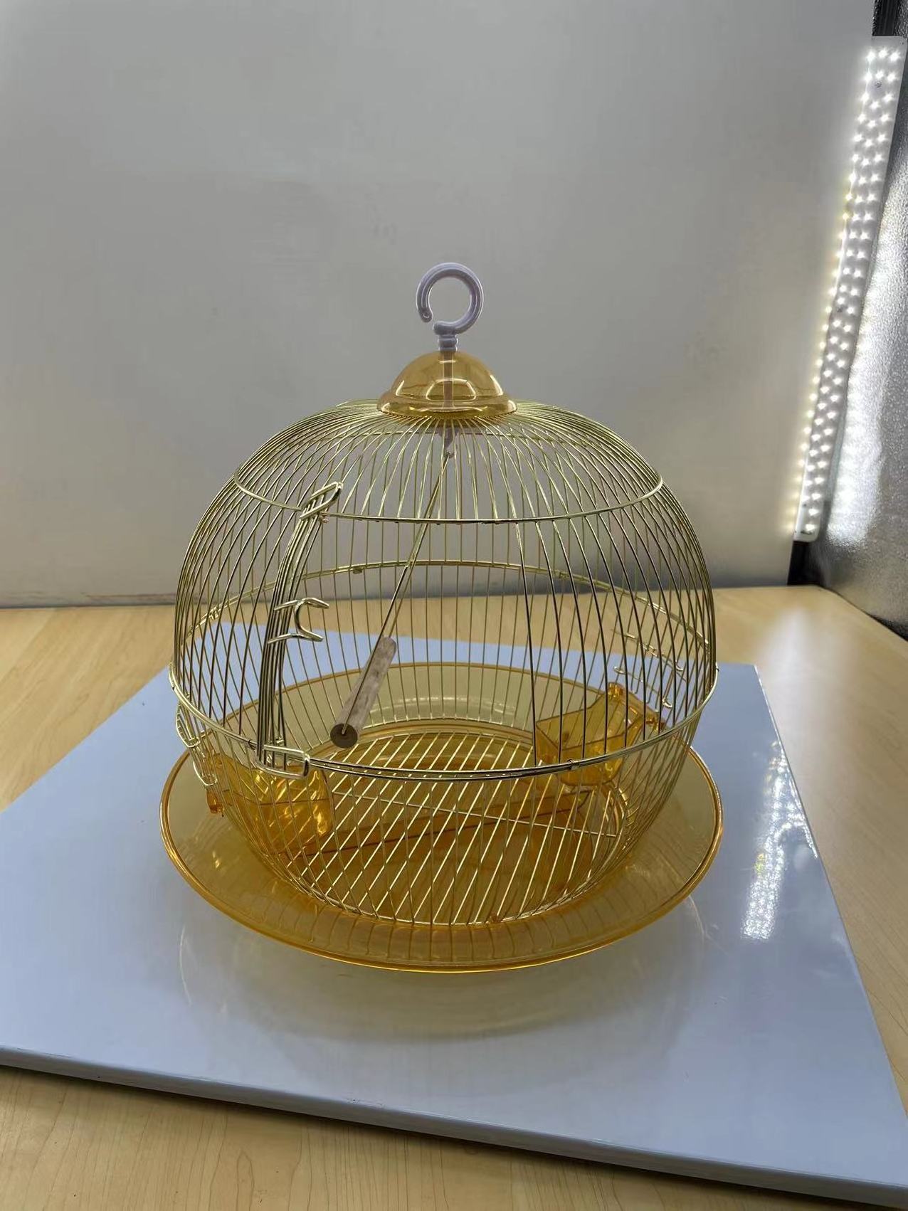 Golden round bird cage