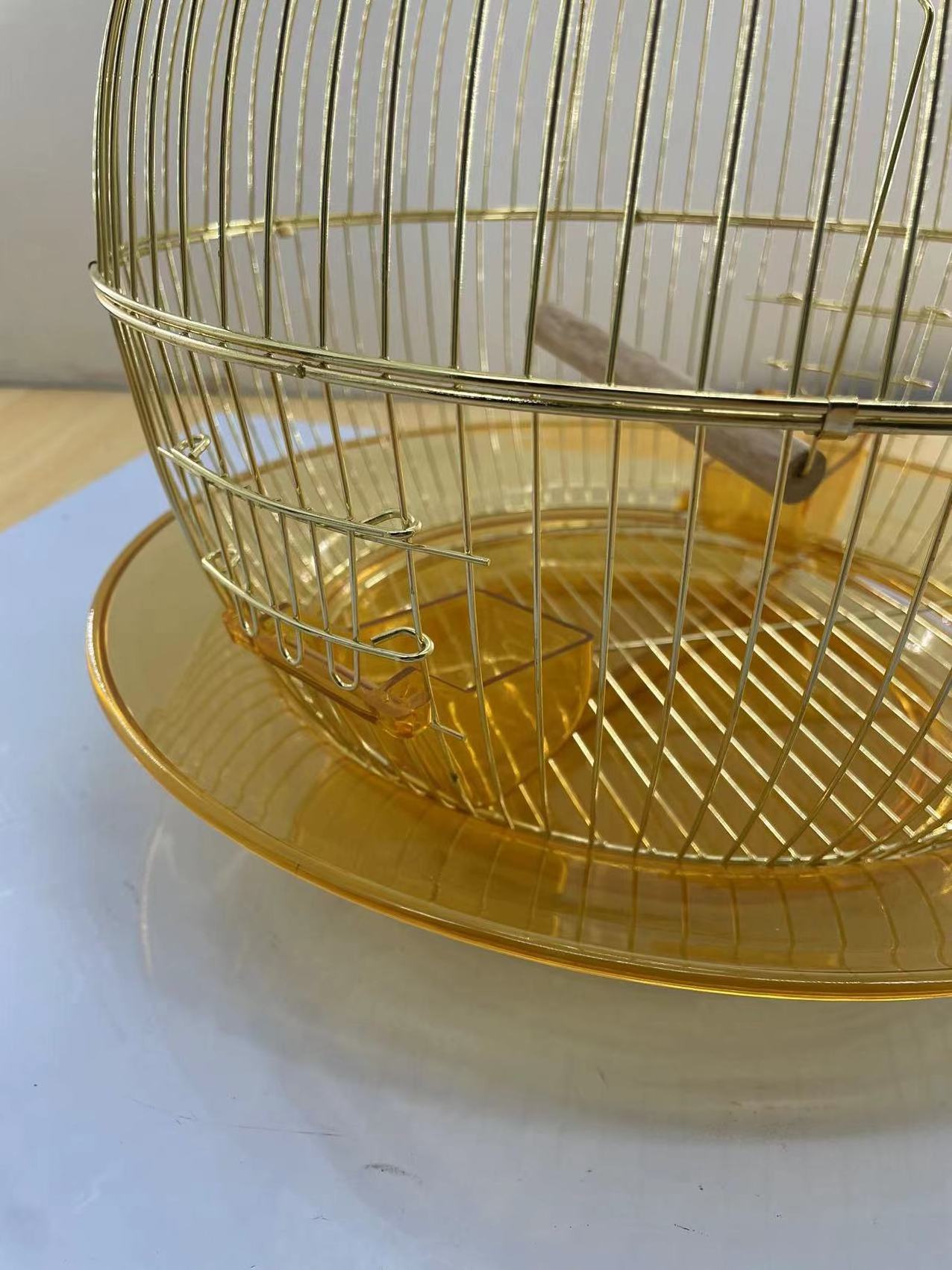 Golden round bird cage