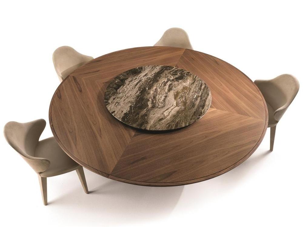 Modern round walnut wooden dining table with rotating centre