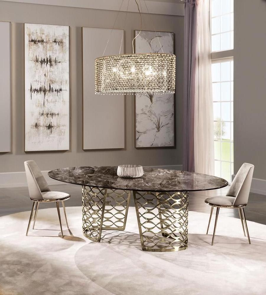 Modern shining gold stainless steel oval glass top dining table