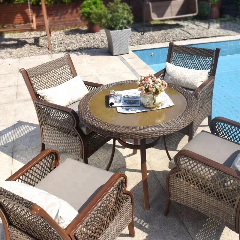 China Traditional Outdoor Patio Garden Furniture Rattan Wicker Dining Table Set 6 Chairs