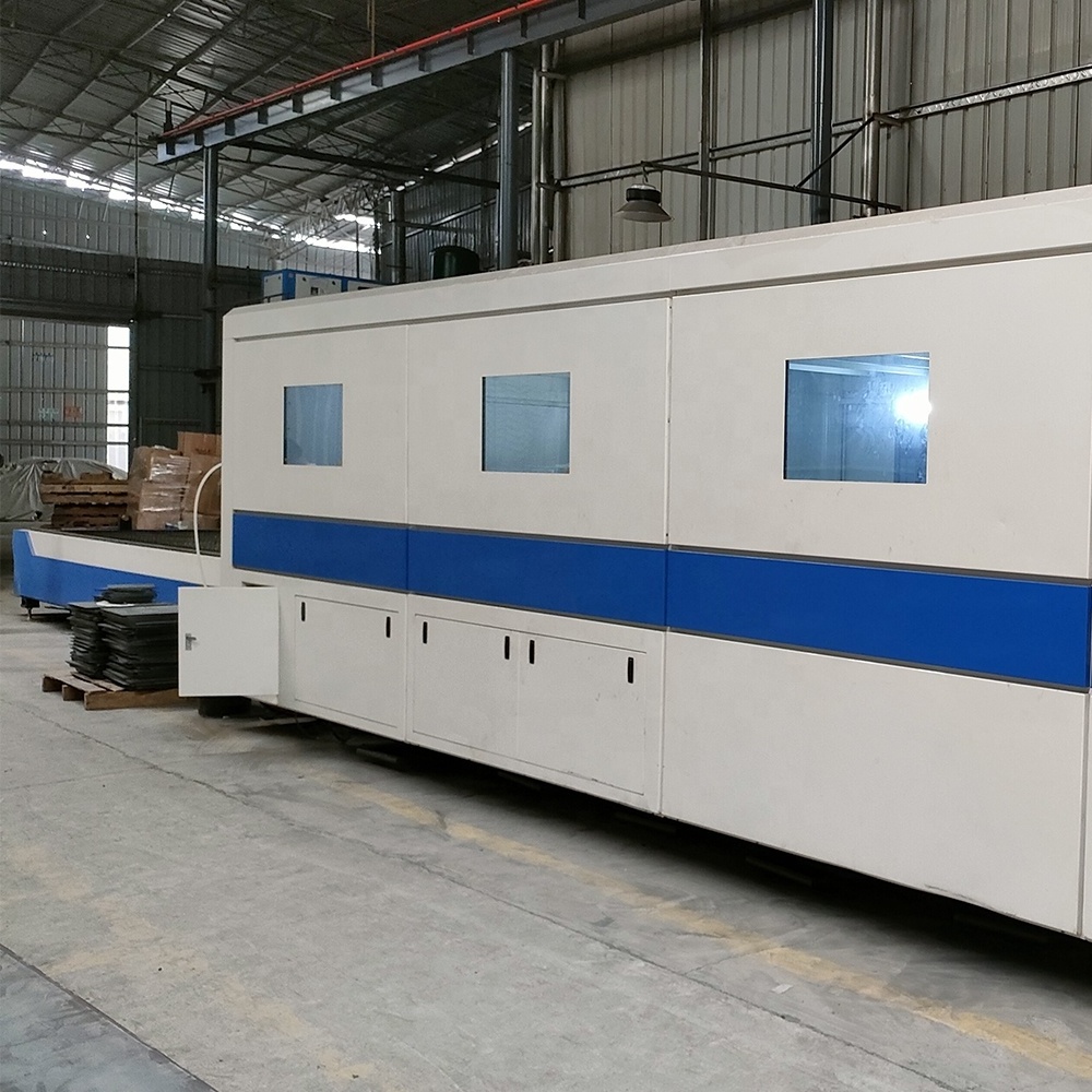 Exchange table fiber laser cutting machine 6000W aluminum steel sheet laser cutter with full enclosed cover Turkey local service