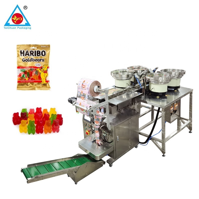 Automatic small vertical gummy bear soft candy capsule tablet sachet packing machine with vibration plate