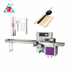 horizontal wooden pp spoon packing machinery fork disposable plastic cutlery napkin packaging machine