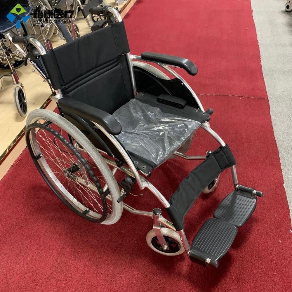 Light weight folding black wheelchair price with pneumatic rear wheel