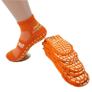 Wholesale non slip socks yoga trampoline grip socks manufacturer