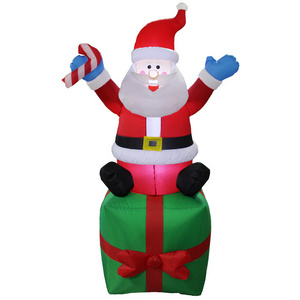 Christmas inflatable Santa on Gift box for festival decoration, yard decoration