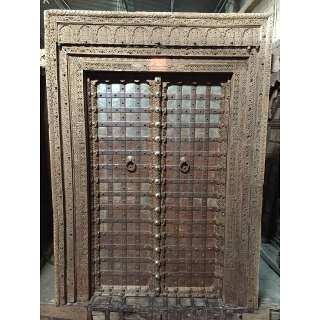 ANTIQUE DOOR IN SOLID WOOD WITH CARVING AND DURABILITY LATEST ANTIQUE DOORS FOR HOTEL FARMHOUSE CLUB HOUSE AND VILLA