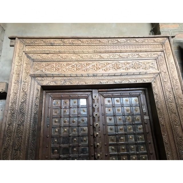 ANTIQUE DOOR IN SOLID WOOD WITH CARVING AND DURABILITY LATEST ANTIQUE DOORS FOR HOTEL FARMHOUSE CLUB HOUSE AND VILLA