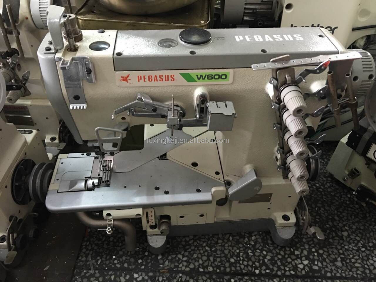 Used Pegasus W600 interlock coverstitch sewing machine for heavy and light fabric hemming machine cylinder bed