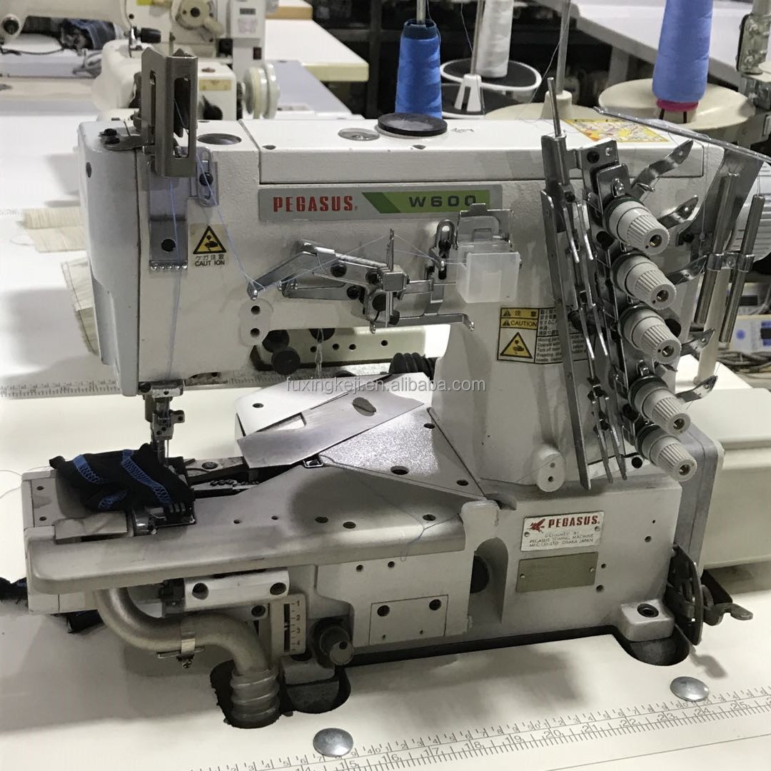 Used Pegasus W600 interlock coverstitch sewing machine for heavy and light fabric hemming machine cylinder bed