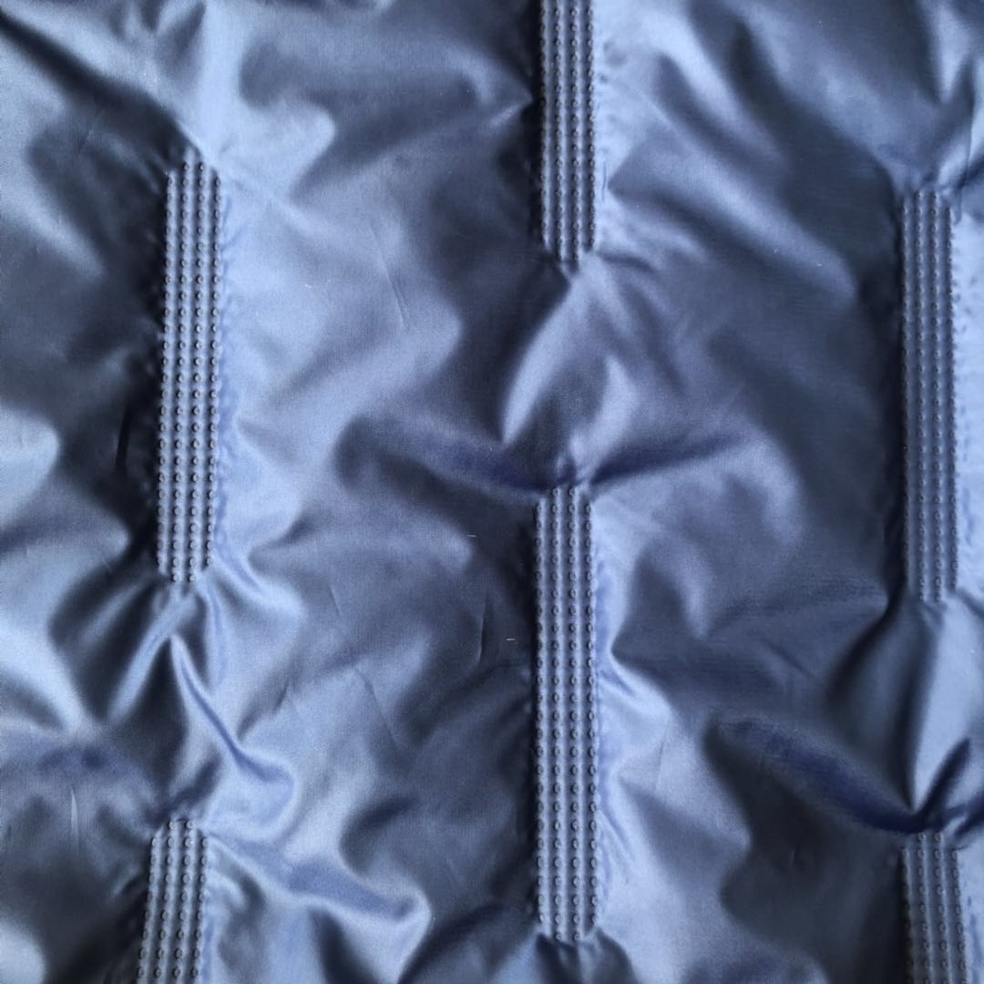 HOT sale custom pattern jacket polyester filling embossing ultrasonic quilted fabric