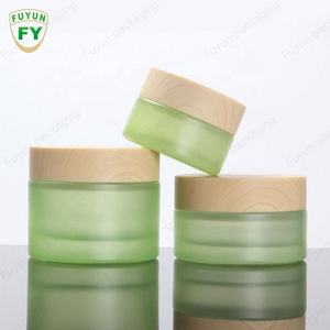 Empty sets clear frosted glass cream jar with bamboo lid glass bottle for toner lotion cosmetic packaging