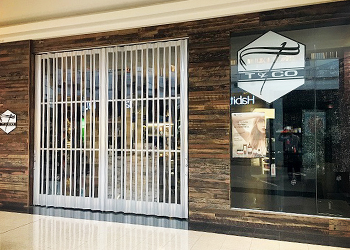 polycarbonate shopping mall store front folding sliding door aluminum grill secure door