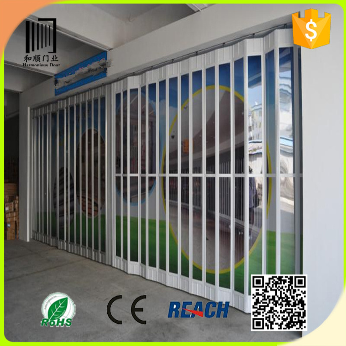 transparent polycarbon bifold shutter doors/commercial sliding folding door/ vertical folding door