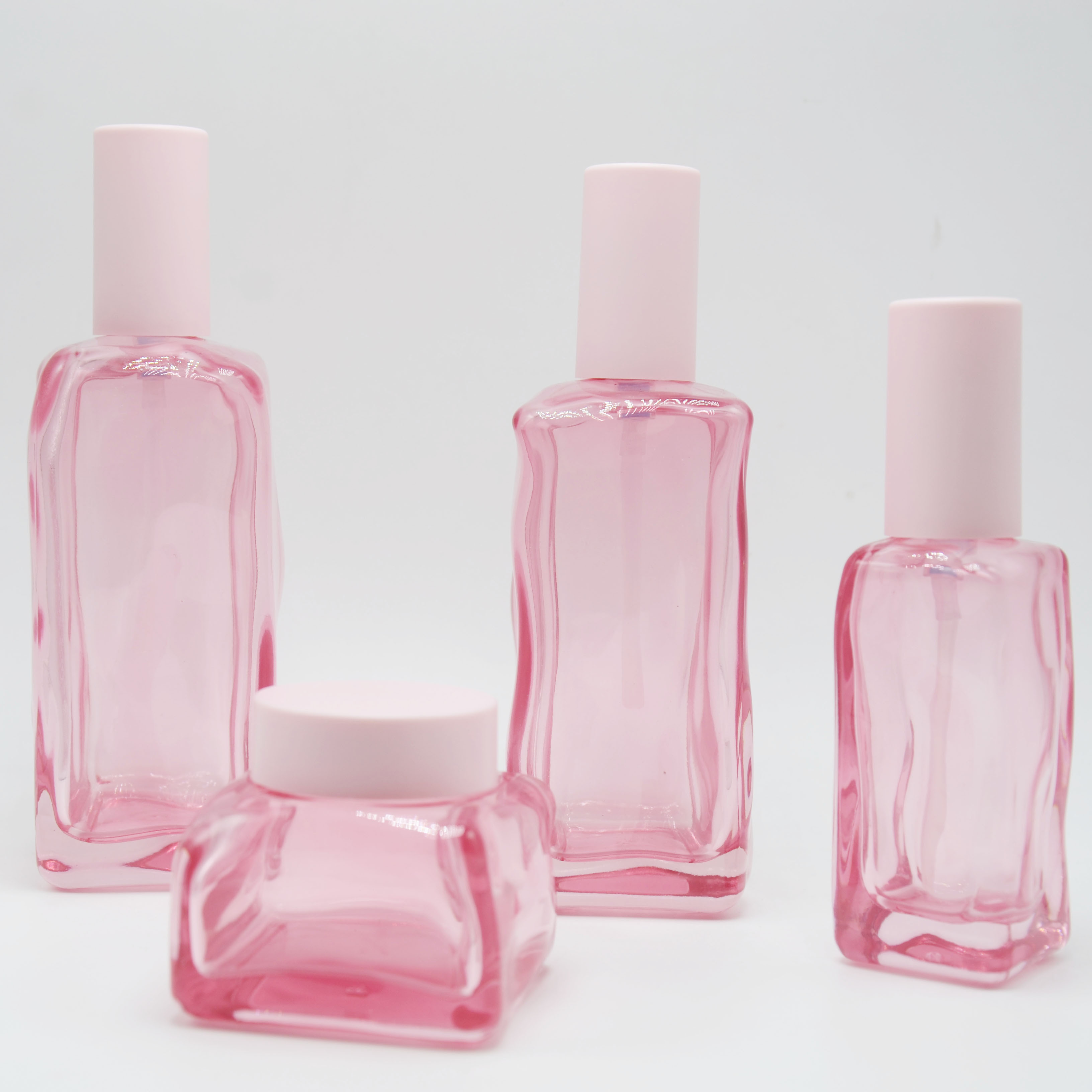 Unique Design Cosmetic Packaging Set 50g 40ml 100ml 120ml Pink Square Glass Lotion Pump Bottles Cream Jars