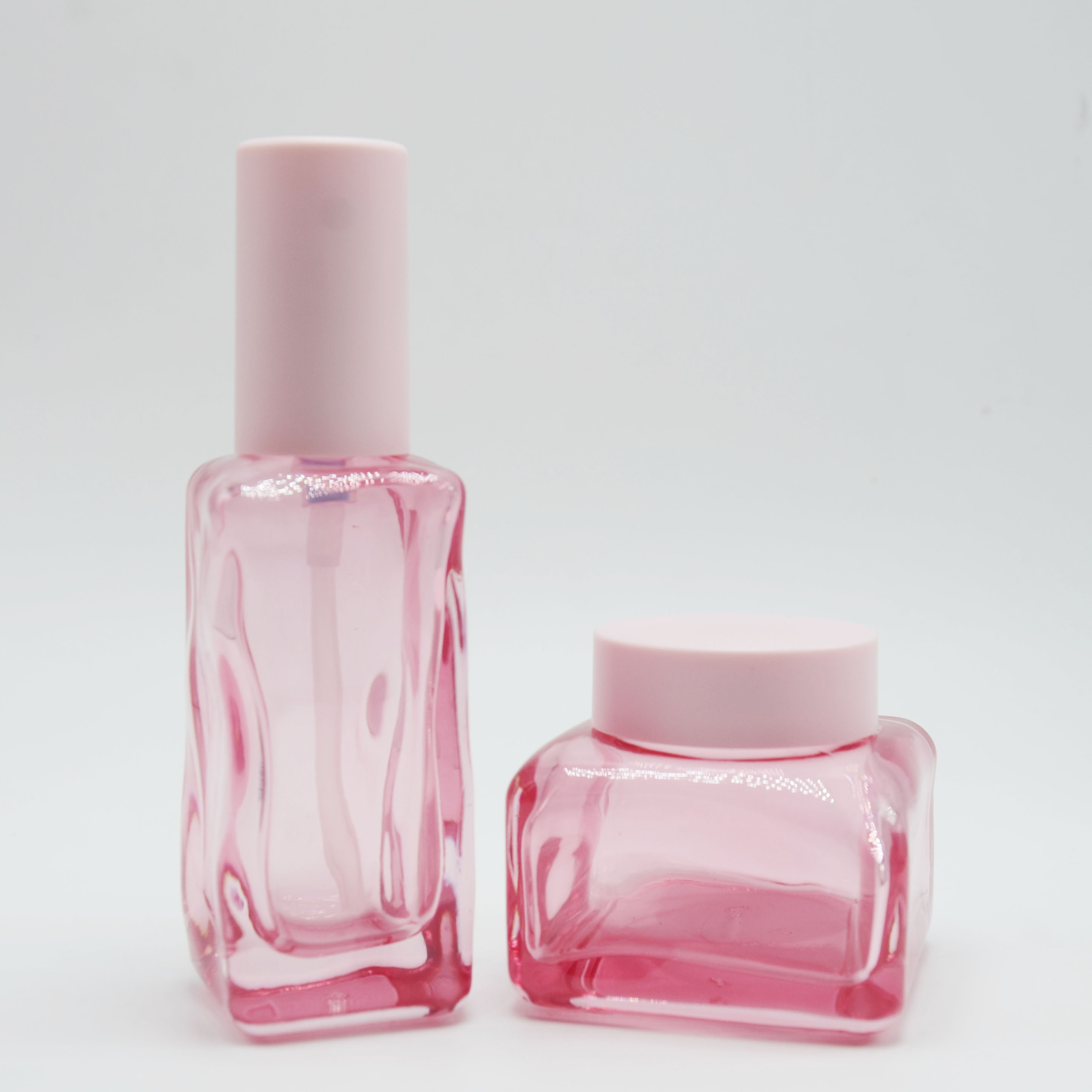 Unique Design Cosmetic Packaging Set 50g 40ml 100ml 120ml Pink Square Glass Lotion Pump Bottles Cream Jars