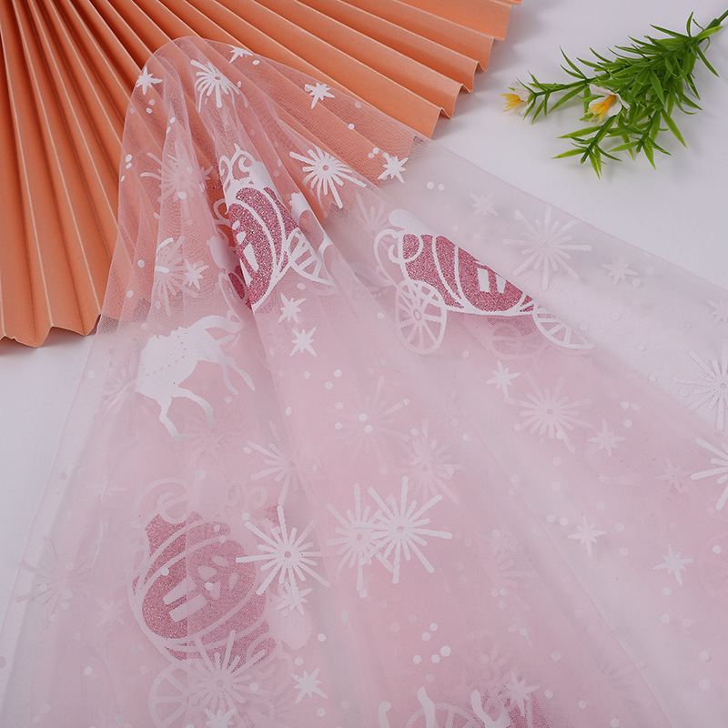 The new best-selling Christmas themed printed tulle. Princess Aisha skirt fabric. Tutu skirt fabric. DIY toy tulle