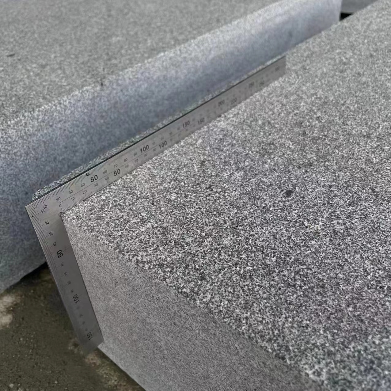 Hot sale Zhangqiu granite G654 , China black flamed litchi polished stone floor paving stone Granite Curbstone Customized