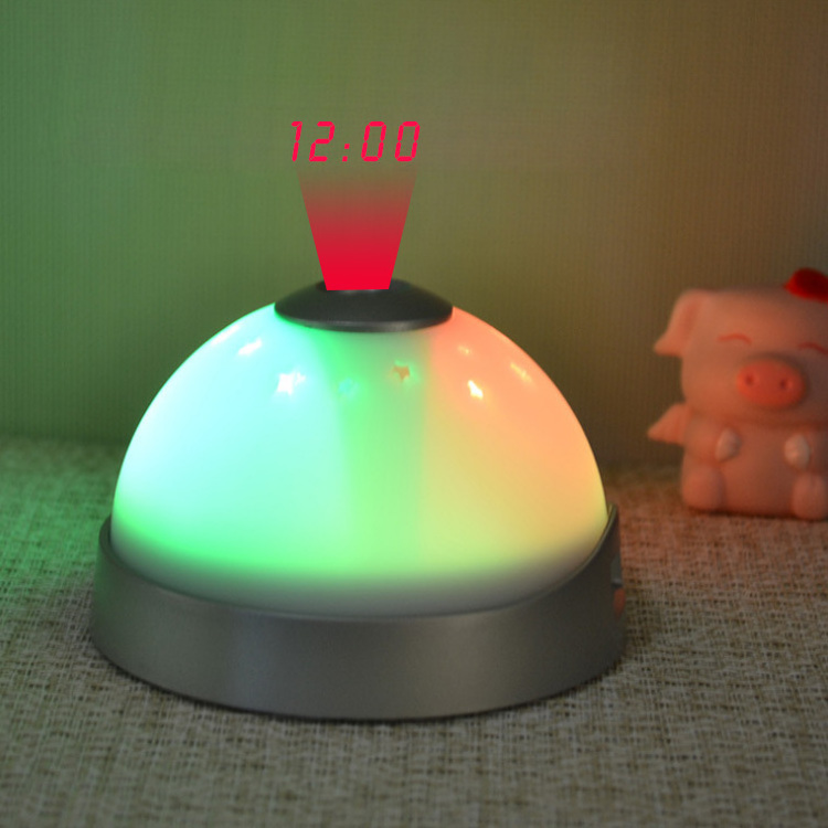 Glowing led color change digital alarm clock with projector