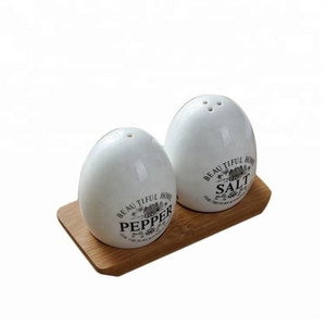 Funky decorative egg shape small custom made ceramic airline salt and pepper shaker