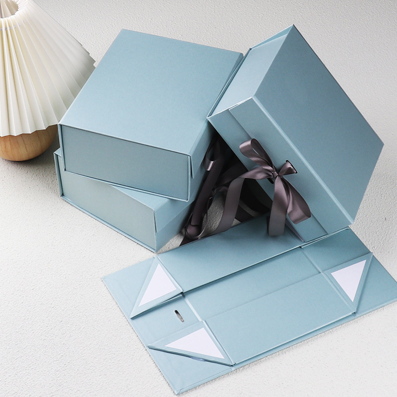 high-ended baby clothes folding gift paper packaging Box travel perfume bottle cosmetic skincare packaging gift box with ribbon