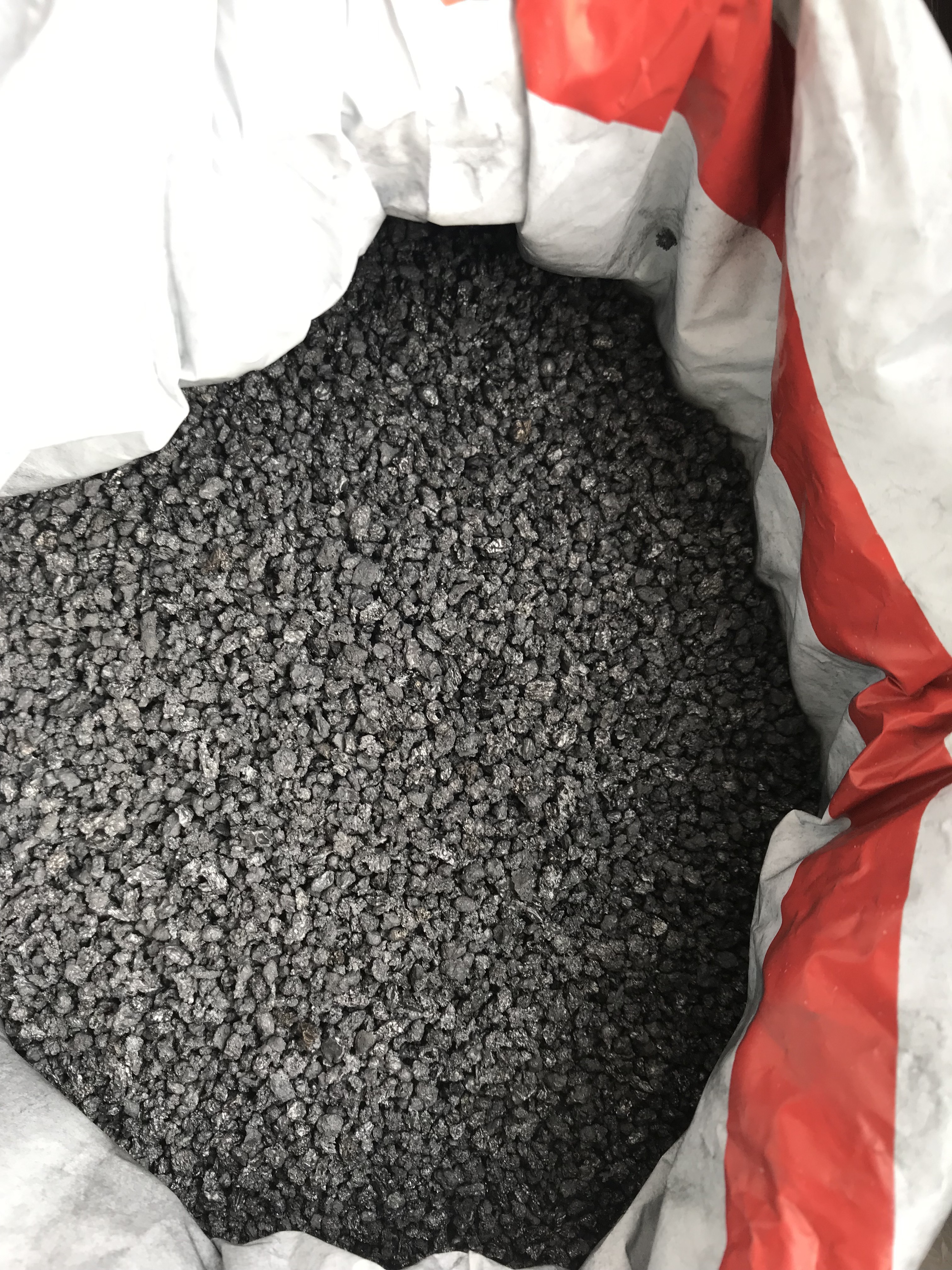 Low ash low sulphur calcined petroleum coke (CPC) as a recarburizing agent anode-grade petroleum coke