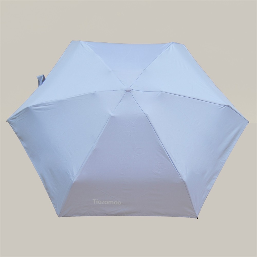 Custom Mini Sombrillas paraguas umbrella Manual Capsule Uv Protection Lady Small Folding Umbrella for sun and rain