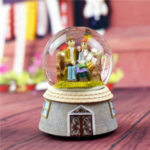 Hot Sell 80/100mm City of Sky Snow Globe Music Box with Light and Snow Pump Lovers Crystal Ball forDecoration