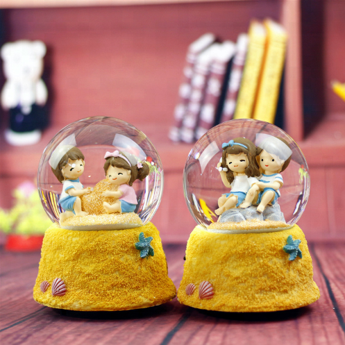 Hot Sell 80/100mm Beach Lovers Snow Globe Music Box with Light and Snow Pump Students Crystal Ball for Decoration