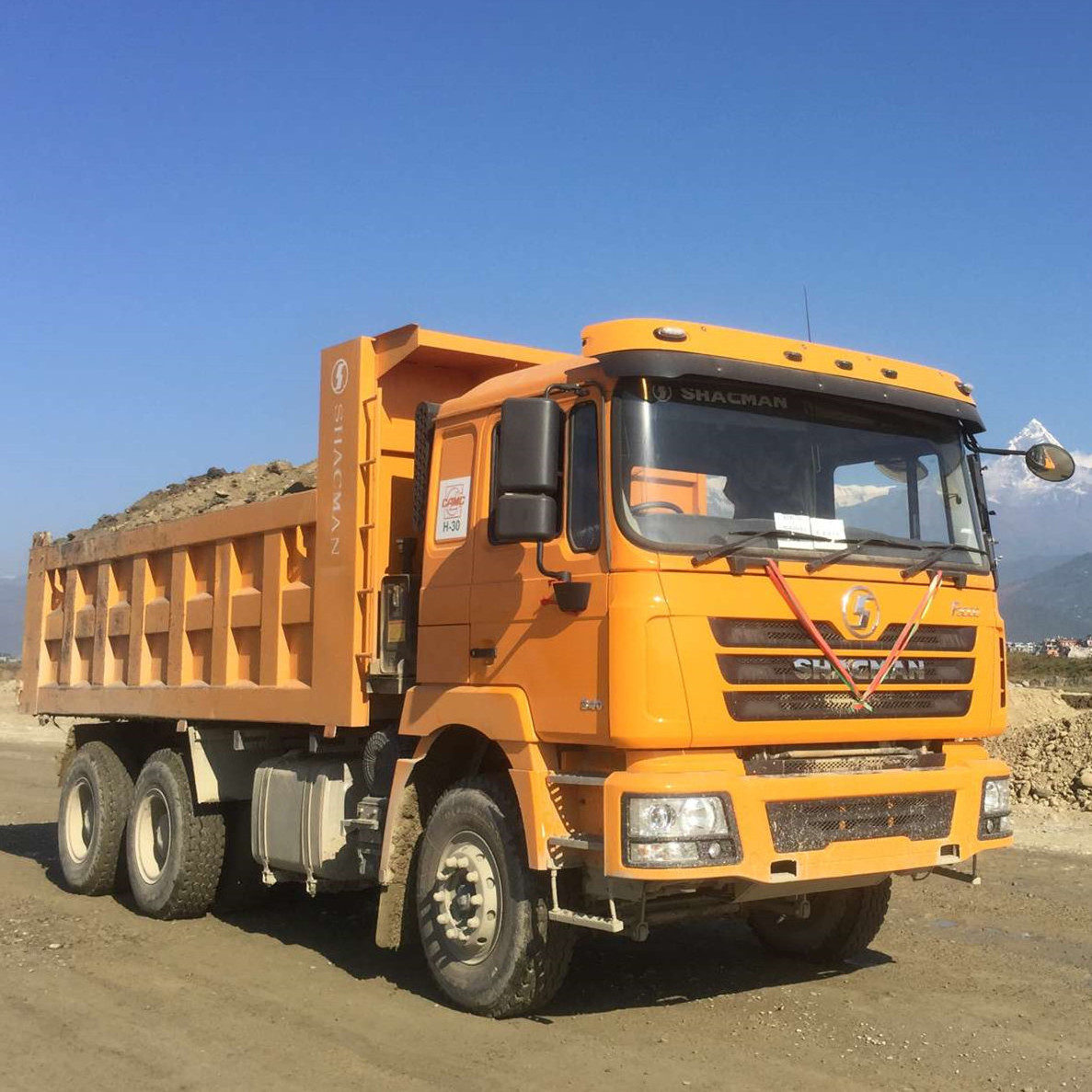 China Shacman heavy duty 6x4 10 wheels Euro 2  diesel dump tipper truck for transporting mucks and stones