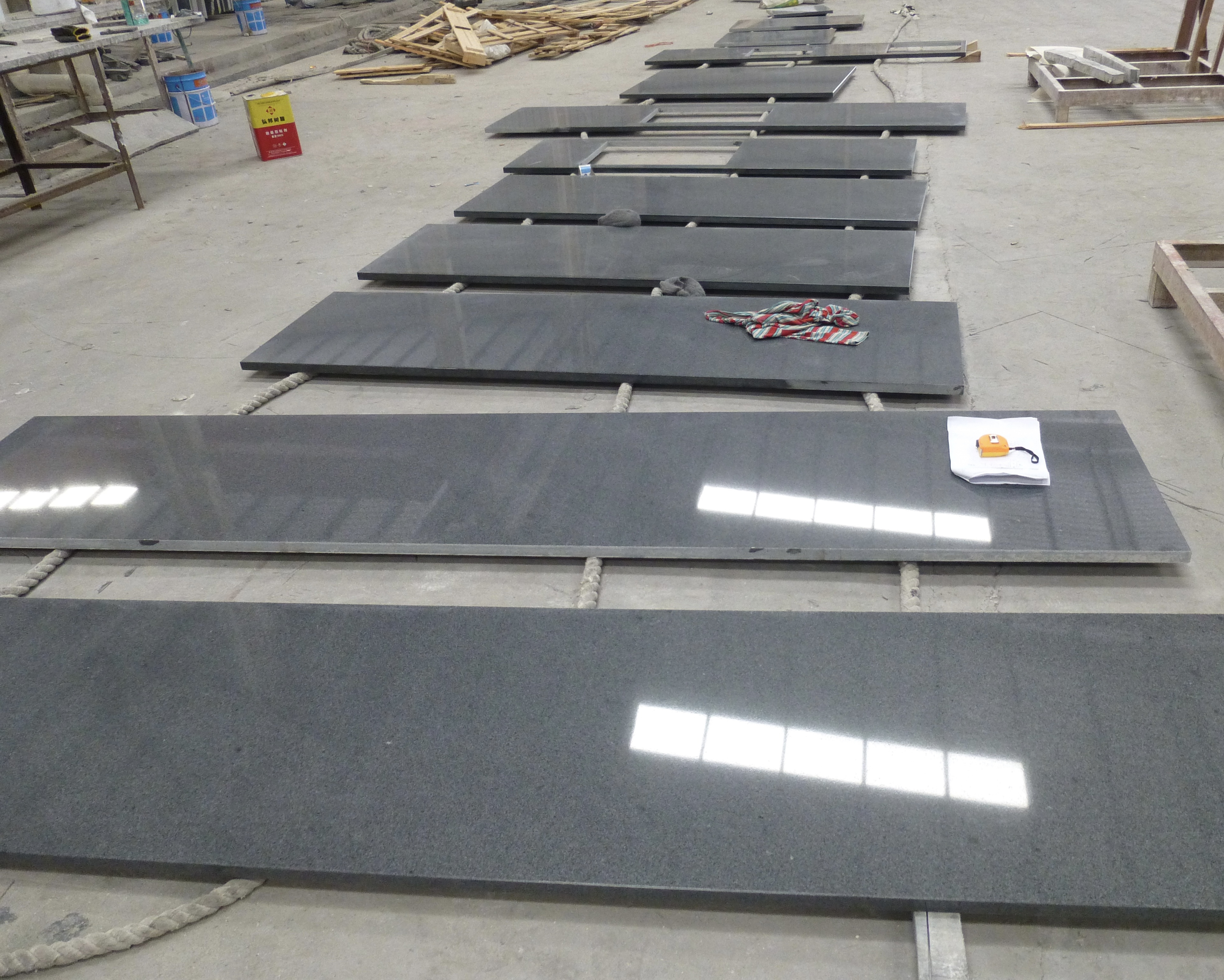 Wholesale Cheap G654 dark grey granite stone tiles Padong dark China impala black granite slabs