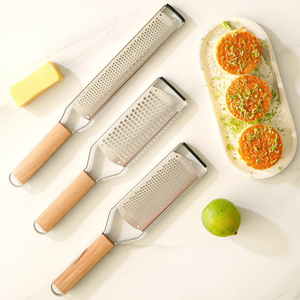 Durable stainless steel cheese grater with wooden handle  lemon zester