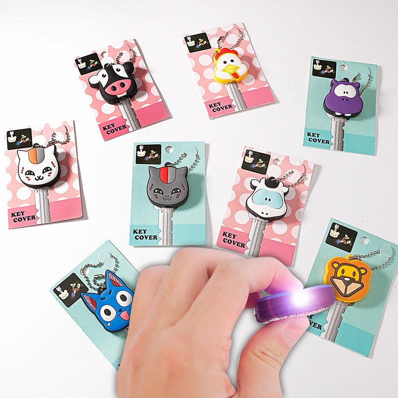 Wholesale cartoon character led light pvc plastic key cover