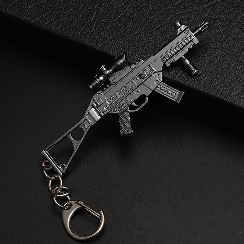 Hot mini metal rubber band hand guns valorant butterfly knife keychain accessories