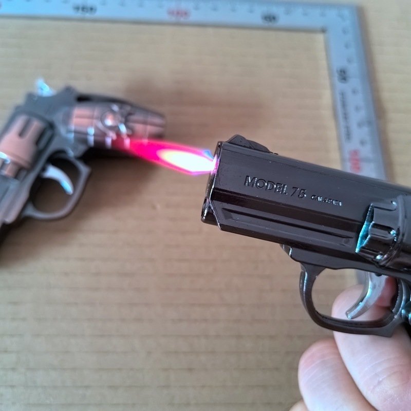 Creative with light toy pistol shape windproof lighter metal light light laser cigarette lighter cigarette wholesale