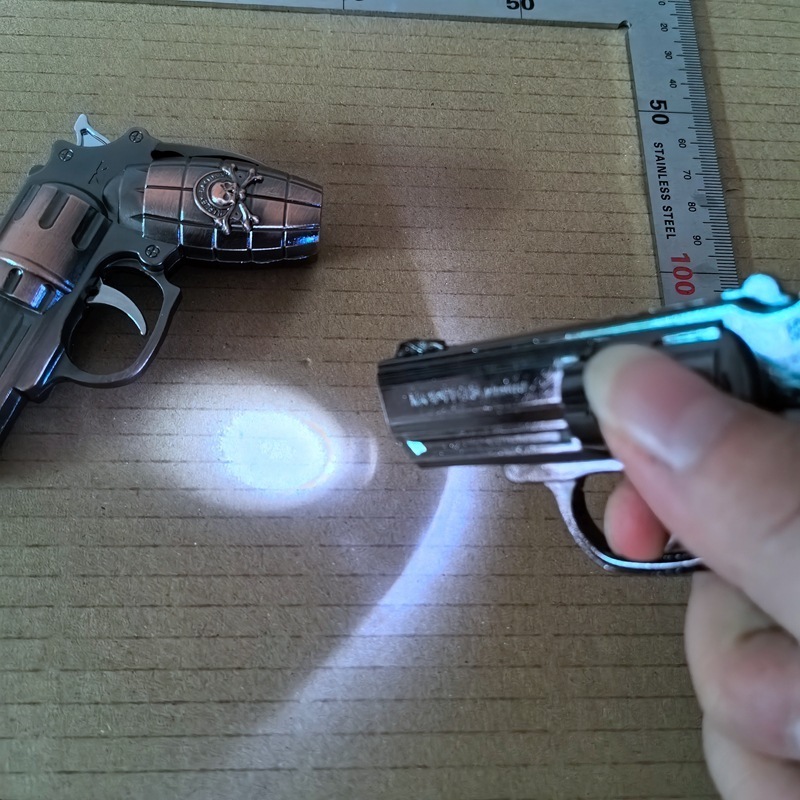 Creative with light toy pistol shape windproof lighter metal light light laser cigarette lighter cigarette wholesale